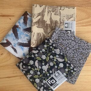 4 fat quarters    Outdoorsy fabrics   Cotton.  Eagles, deer. Forest floral